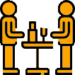 Two people dining with drinks at table.