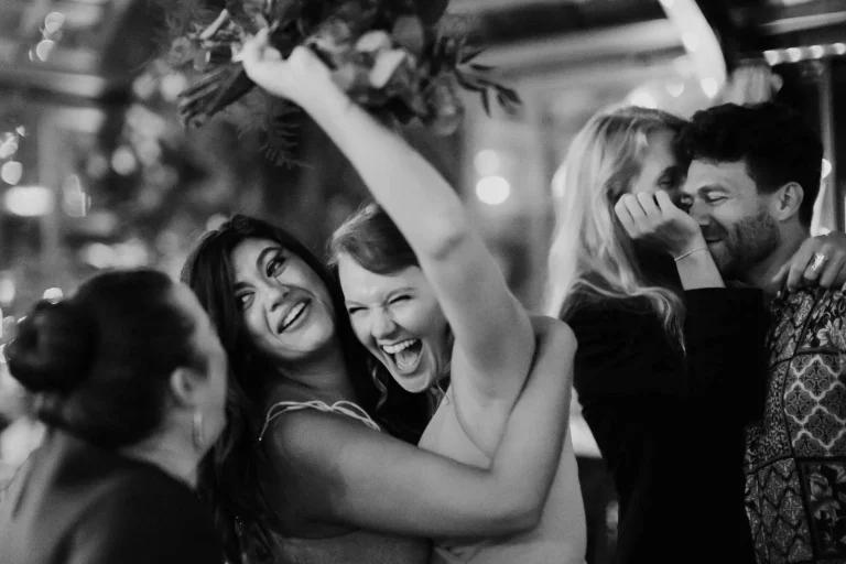 Group celebrating with joy and laughter at party