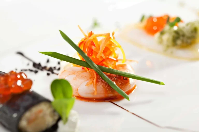 Gourmet seafood dish with garnish and roe.